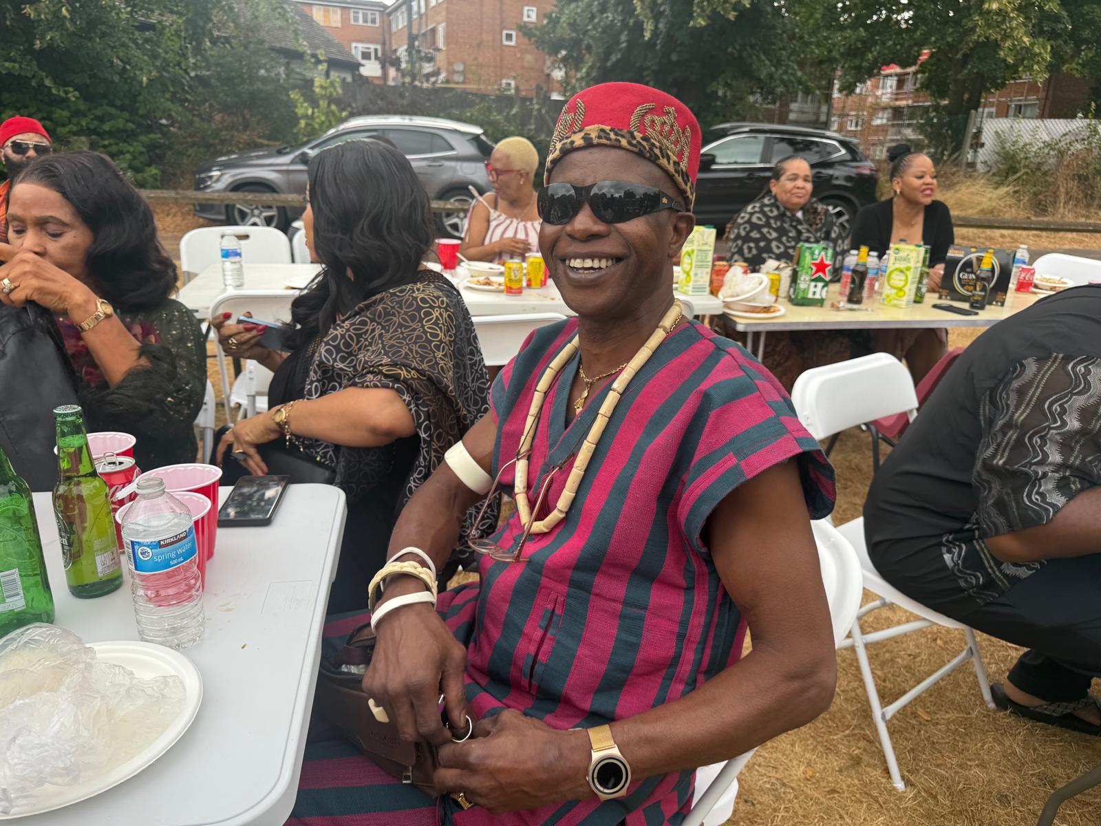 An elder in Igbo red cap and traditional attire at the AUF event